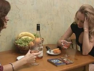 Two cuties swallow wine and talk