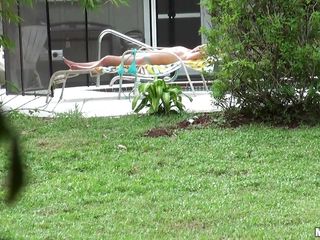on the other hand this pervert is enjoying some natural scenery that pertains to lovely curves of this sexy milf who is oblivious to the rest of the world and is lying on her Sun lounger trying to get a nice even tan. only this pervert discovered her and filmed her totally stripped without her consent.