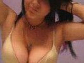 Cute teen makes a striptease vid for her boyfriend. She shows off some charming boobs and her shaven pussy.