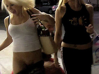 Two Cute Angels shopping at the ninety nine cent store are being stocked by a couple of creepsters. One Time they go out side one of the dudes runs up and pulls the blond's pants down. Is there grass on the field?