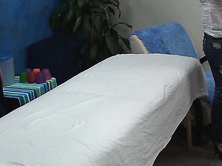 Blond beauty takes off garments and lingerie slowly and then lies on massage table. Impressive masseur enters the room and this chick becomes turned on seeing him. The girlie makes a decision to tempt him to fuck herЕ