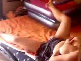 Girl caught by boyfriend filming from bedroom door way massaging her large milk sacks and masturbating her pussy.