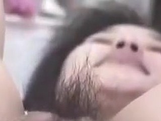 Korean slut with big pussy and pouty lips gets wicked on camera. She stuffs her hairy pussy with fingers, metal balls and even a bottle. This cunt can swallow a lot of jizz too!