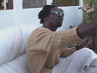 Hot ebony slurps his large black cock and then receives pussy drilled