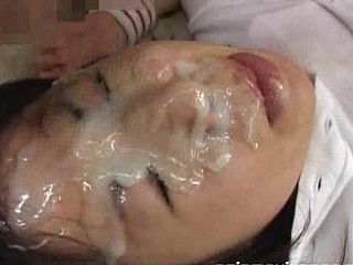 Cosplay asians receives fucked  fingered  pleasured with a vibrator and received bukkake facual cumshots.